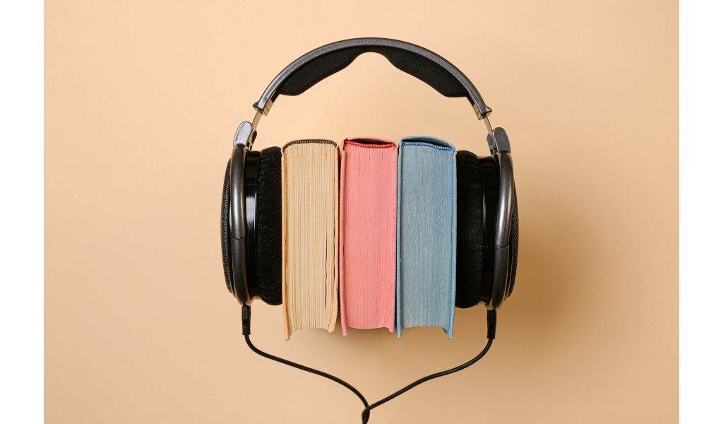 Book with headphones, or audiobooks